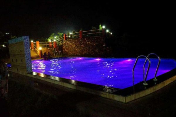 blue colour swimming pool camping in Shivpuri